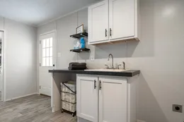 The THE FUSION 3260 Utility Room. This Manufactured Mobile Home features 3 bedrooms and 2 baths.