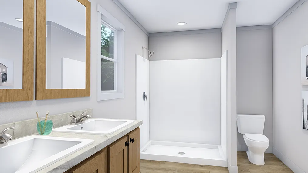 The LOVELY DAY Primary Bathroom. This Manufactured Mobile Home features 4 bedrooms and 2 baths.