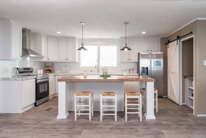 The ISLAND BREEZE Kitchen. This Manufactured Mobile Home features 3 bedrooms and 2 baths.