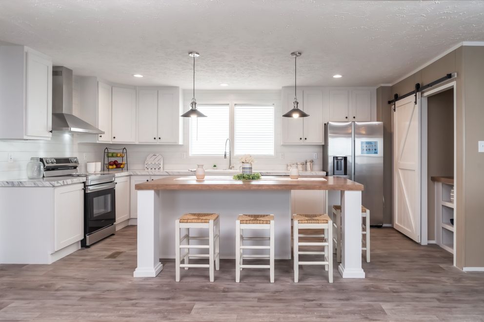 The ISLAND BREEZE Kitchen. This Manufactured Mobile Home features 3 bedrooms and 2 baths.