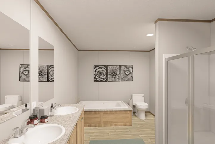 The THE EAGLE 52 Primary Bathroom. This Manufactured Mobile Home features 3 bedrooms and 2 baths.