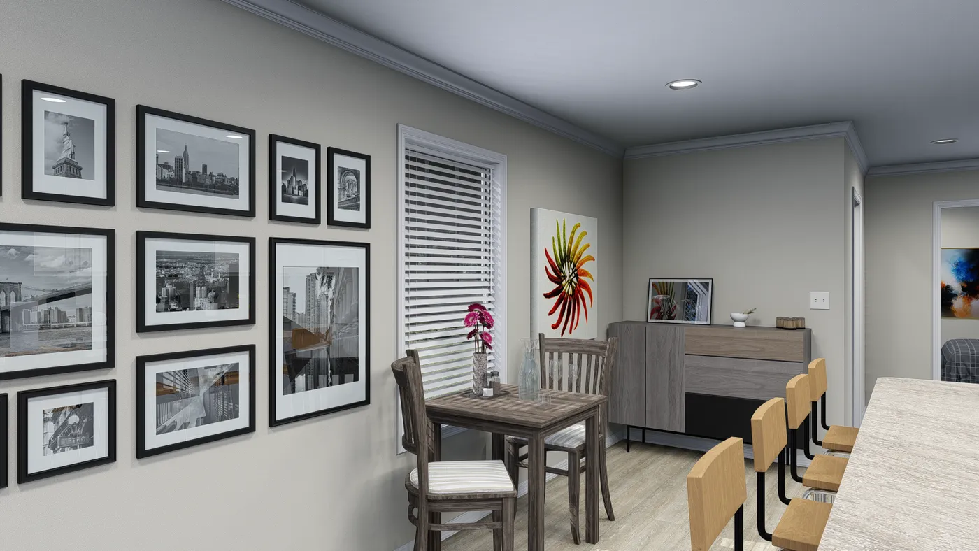 The 7010 "YADKIN" 7616 Dining Area. This Manufactured Mobile Home features 3 bedrooms and 2 baths.