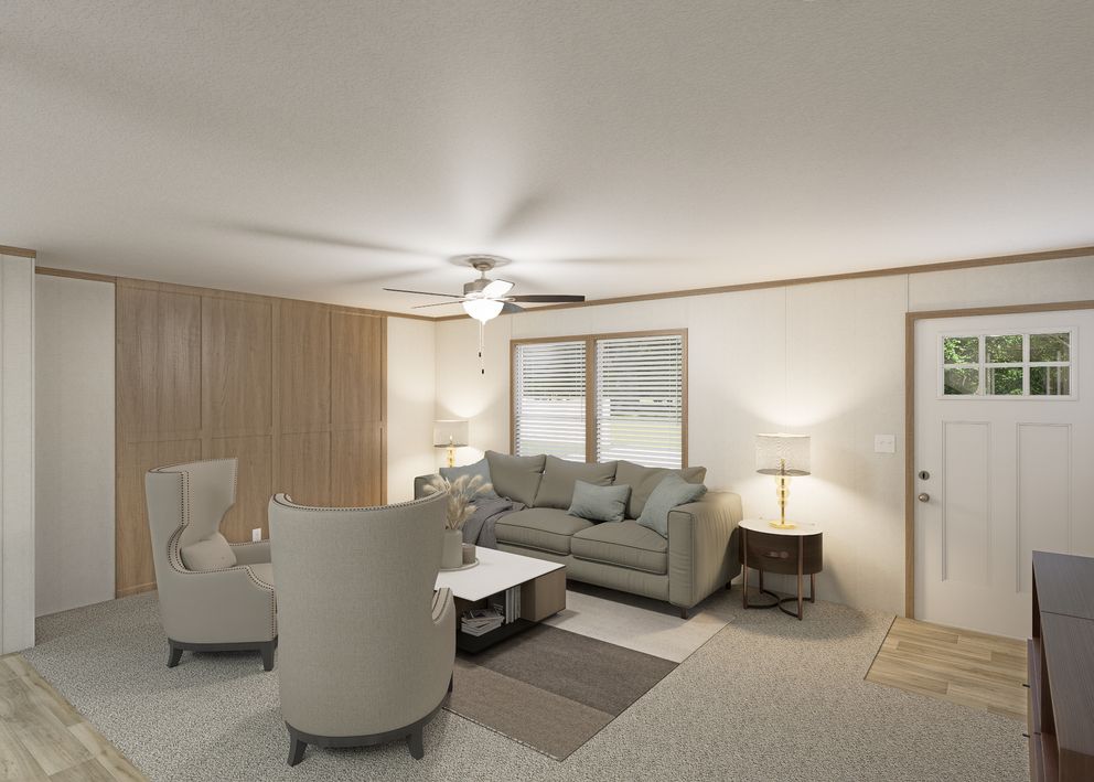 The THE RESERVE 52 Living Room. This Manufactured Mobile Home features 3 bedrooms and 2 baths.