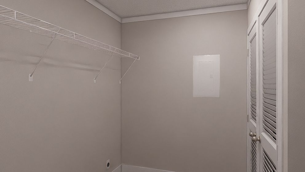 The SHOUT Utility Room. This Manufactured Mobile Home features 3 bedrooms and 2 baths.