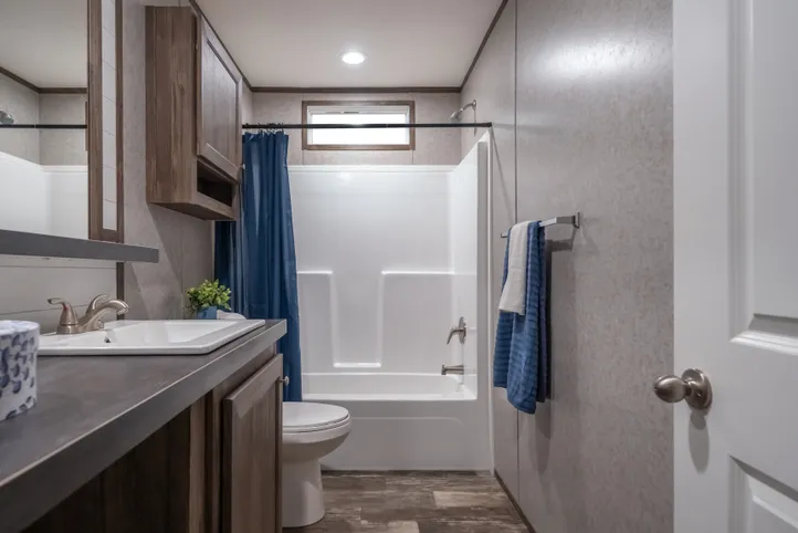 The LOCKLEAR Exterior. This Manufactured Mobile Home features 4 bedrooms and 2 baths.