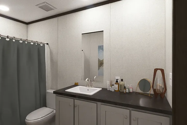 The EMPOWER Guest Bathroom. This Manufactured Mobile Home features 4 bedrooms and 2 baths.