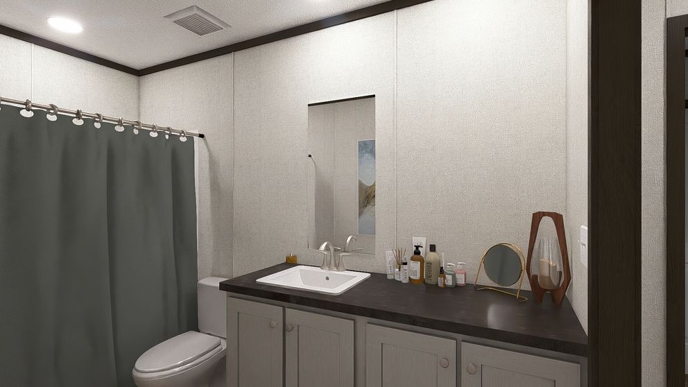 The EMPOWER Guest Bathroom. This Manufactured Mobile Home features 4 bedrooms and 2 baths.