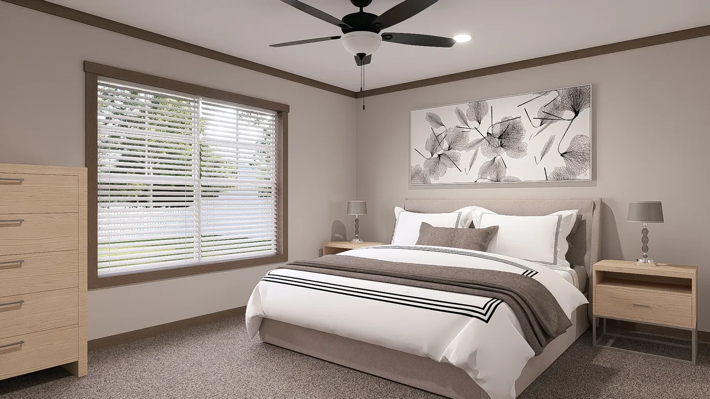 The EVERETT Primary Bedroom. This Manufactured Mobile Home features 4 bedrooms and 3 baths.