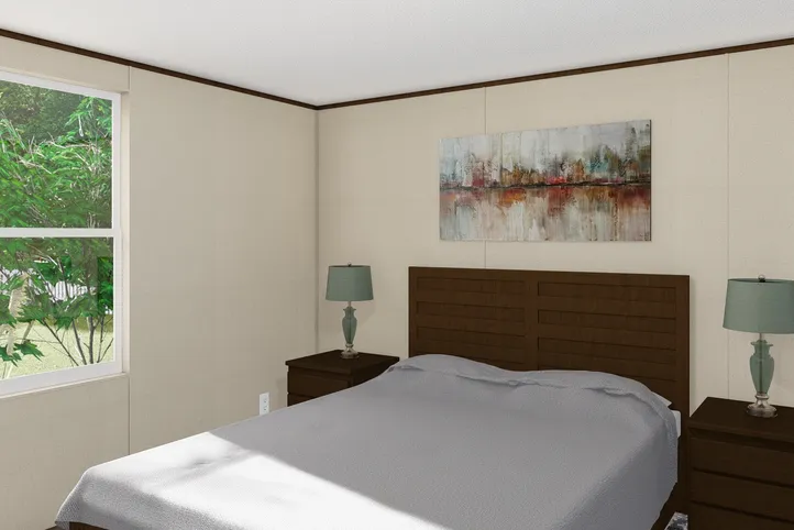 The BLISS Primary Bedroom. This Manufactured Mobile Home features 2 bedrooms and 1 bath.