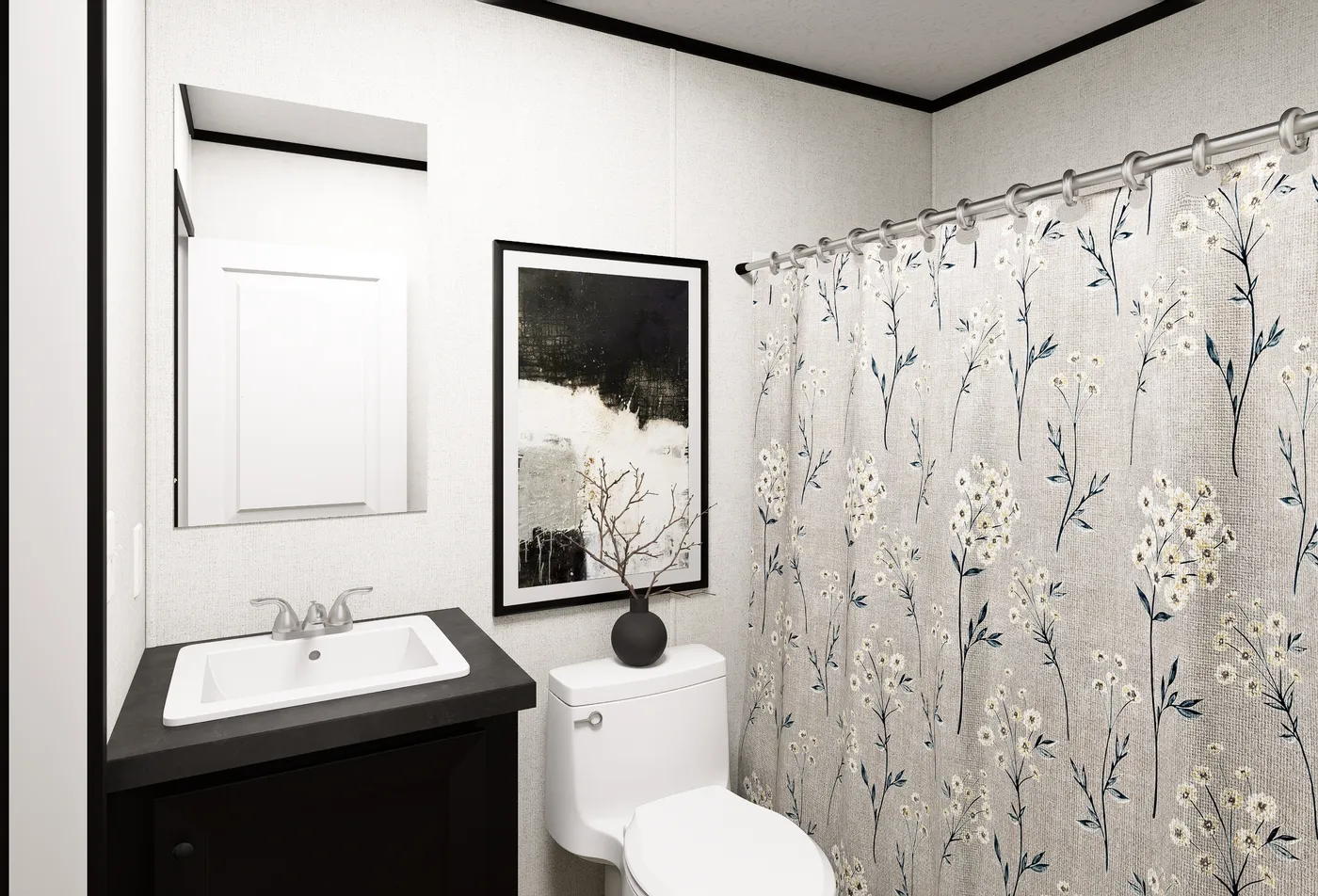 The OASIS Guest Bathroom. This Manufactured Mobile Home features 3 bedrooms and 2 baths.