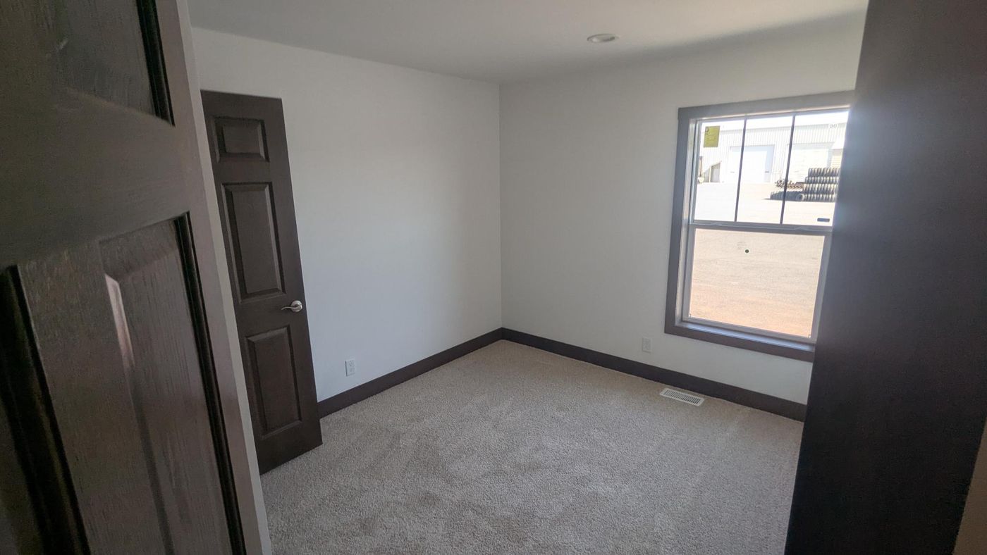 The LEGEND 78 MOD Bedroom. This Modular Home features 3 bedrooms and 2 baths.