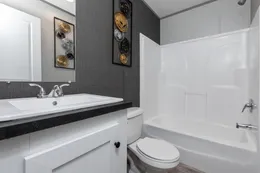 The ANNIVERSARY JEWEL Guest Bathroom. This Manufactured Mobile Home features 3 bedrooms and 2 baths.