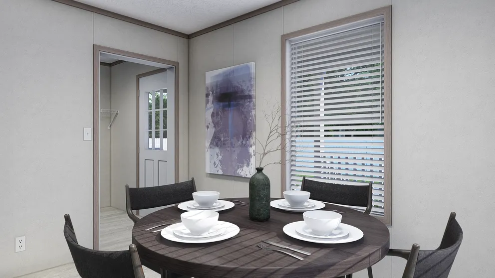 The 5624-E734P THE PULSE Dining Area. This Manufactured Mobile Home features 3 bedrooms and 2 baths.