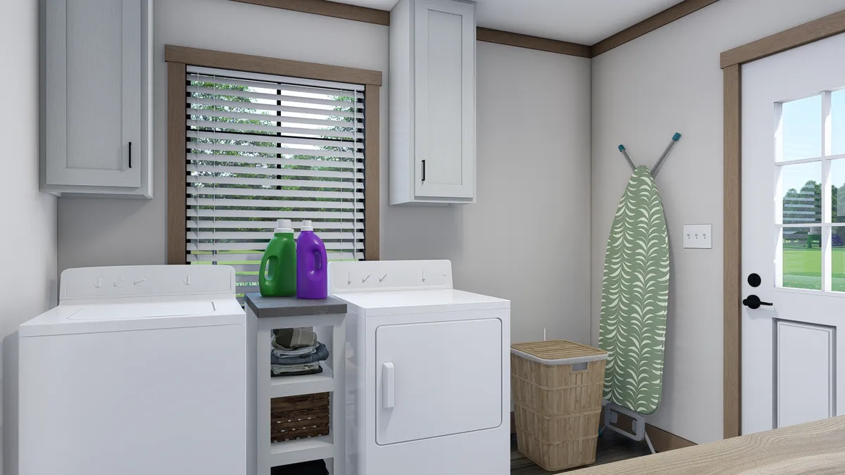 The NELLIE Utility Room. This Manufactured Mobile Home features 4 bedrooms and 2 baths.