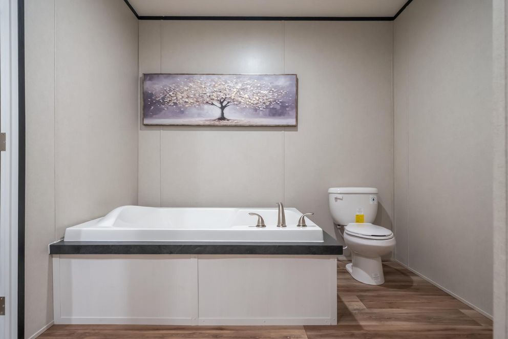 The ELEMENT Primary Bathroom. This Manufactured Mobile Home features 3 bedrooms and 2 baths.