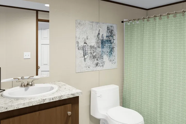 The GLORY Primary Bathroom. This Manufactured Mobile Home features 3 bedrooms and 2 baths.