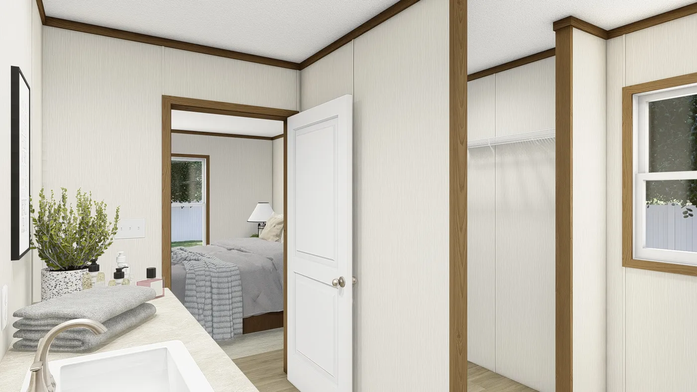 The AMBITION Primary Bathroom. This Manufactured Mobile Home features 4 bedrooms and 2 baths.