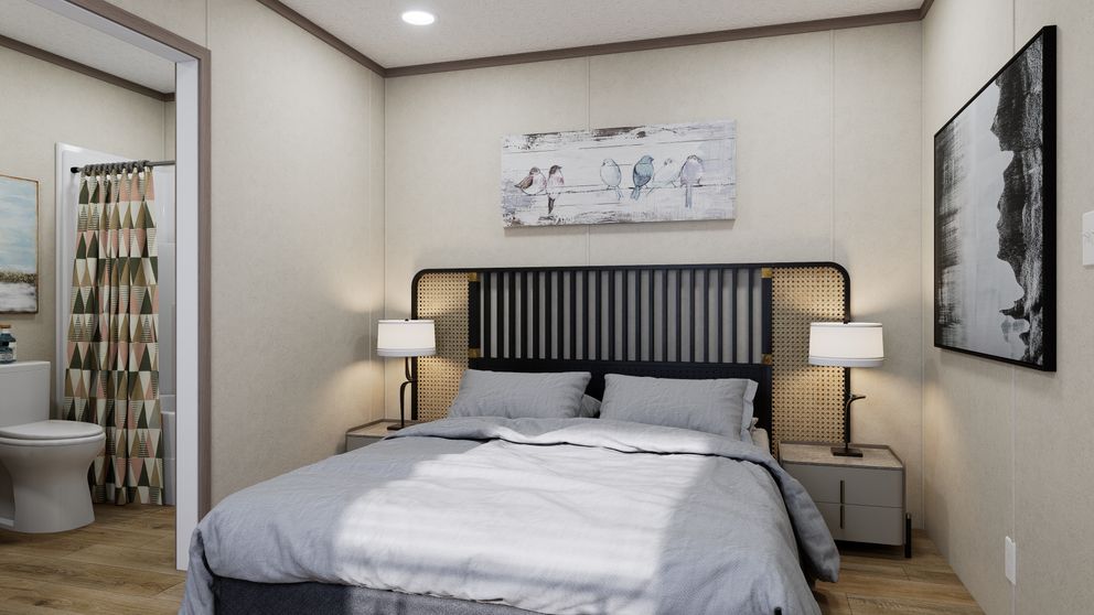 The 6614-CC02 CLEARPATH 66 Primary Bedroom. This Manufactured Mobile Home features 3 bedrooms and 2 baths.
