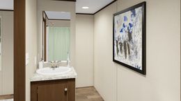 The DELIGHT Primary Bathroom. This Manufactured Mobile Home features 2 bedrooms and 2 baths.