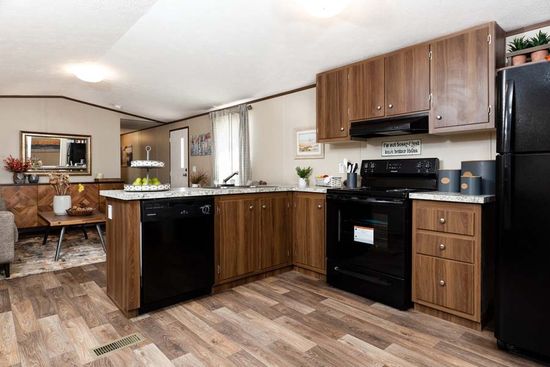 The GRAND Kitchen. This Manufactured Mobile Home features 4 bedrooms and 2 baths.