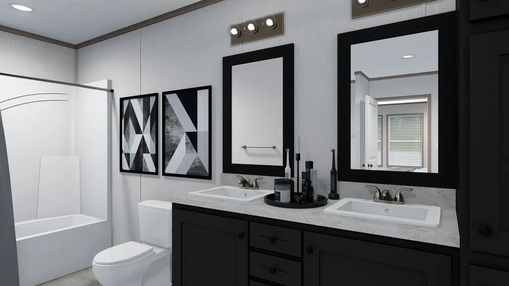 The 6428-E792 THE PULSE Primary Bathroom. This Manufactured Mobile Home features 3 bedrooms and 2.5 baths.