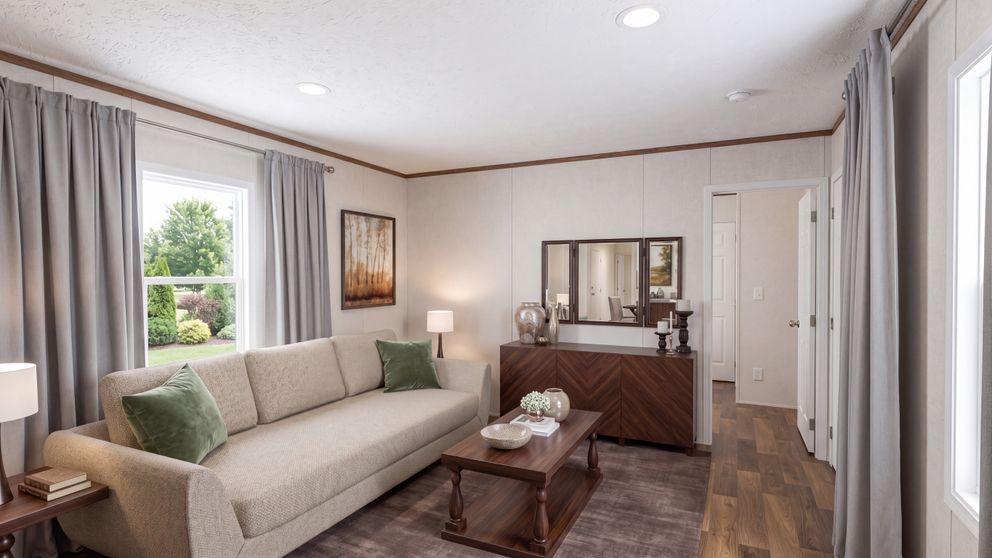 The ELM Living Room. This Manufactured Mobile Home features 2 bedrooms and 1 bath.