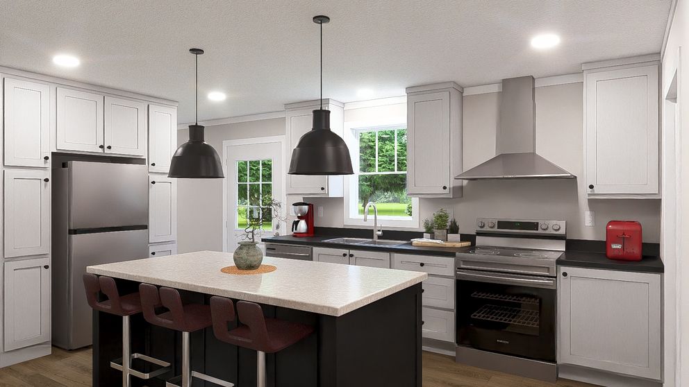 The SHOUT Kitchen. This Manufactured Mobile Home features 3 bedrooms and 2 baths.