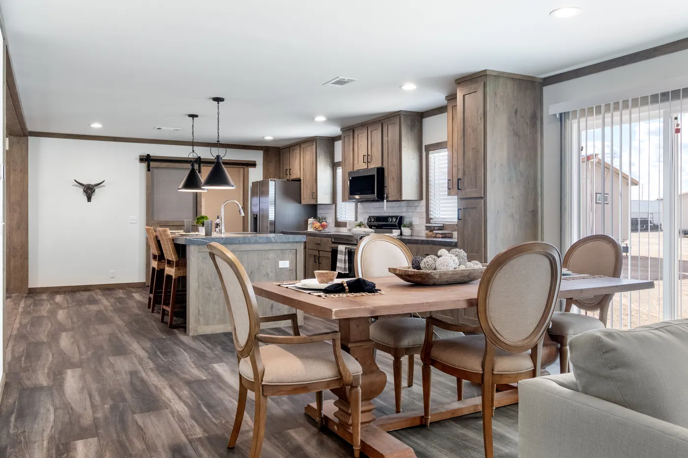 The ISABELLA ELITE Dining Area. This Manufactured Mobile Home features 3 bedrooms and 2 baths.