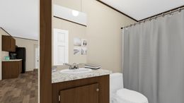 The THRILL Guest Bathroom. This Manufactured Mobile Home features 3 bedrooms and 2 baths.