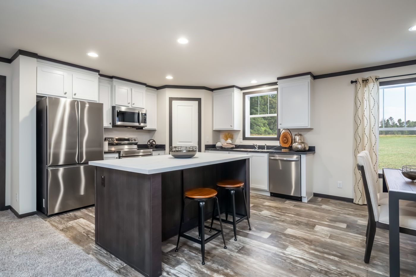 The 5628-MS067-2 HUNTINGTON Kitchen. This Manufactured Mobile Home features 4 bedrooms and 2 baths.