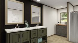 The EVEREST Primary Bathroom. This Manufactured Mobile Home features 4 bedrooms and 2 baths.