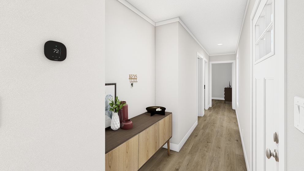 The RHYTHM NATION Foyer. This Manufactured Mobile Home features 3 bedrooms and 2 baths.