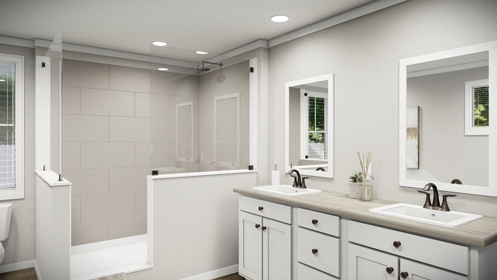 The THE WASHINGTON Primary Bathroom. This Manufactured Mobile Home features 3 bedrooms and 2 baths.