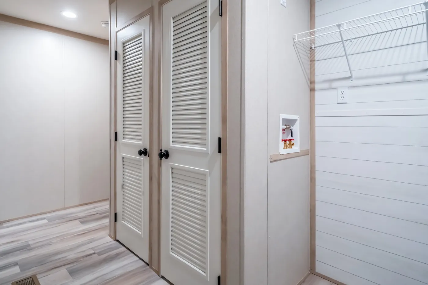 The ANNIVERSARY JEWEL Utility Room. This Manufactured Mobile Home features 3 bedrooms and 2 baths.
