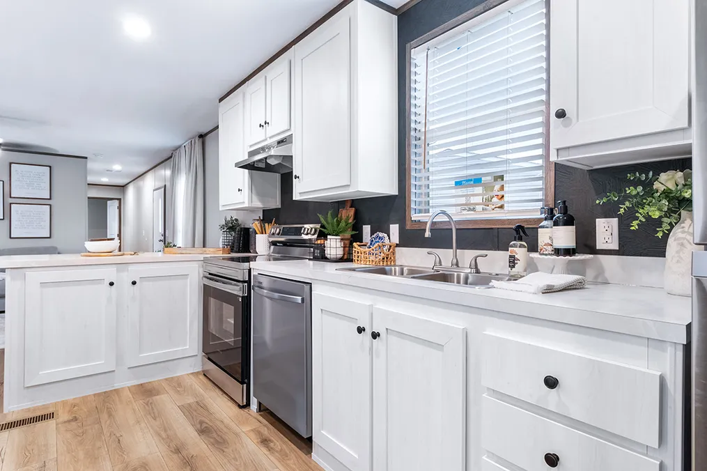 The SELECT 16723A Kitchen. This Manufactured Mobile Home features 3 bedrooms and 2 baths.