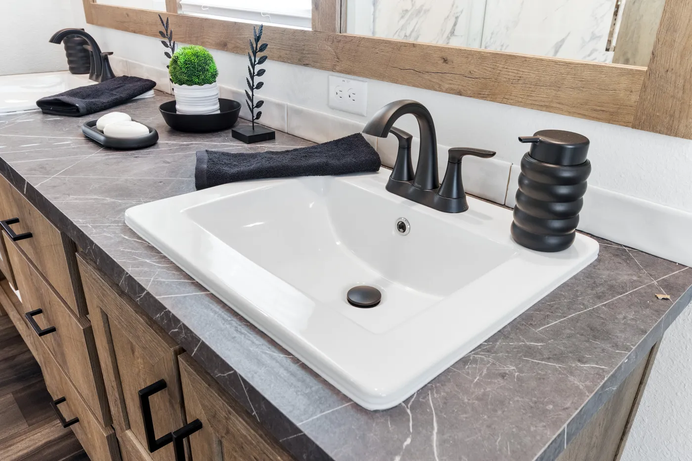 The ISABELLA ELITE Primary Bathroom. This Manufactured Mobile Home features 3 bedrooms and 2 baths.