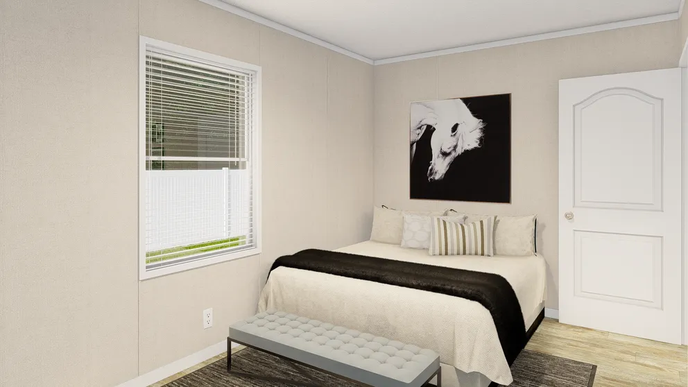 The GRAND LIVING 76B Bedroom. This Manufactured Mobile Home features 3 bedrooms and 2 baths.