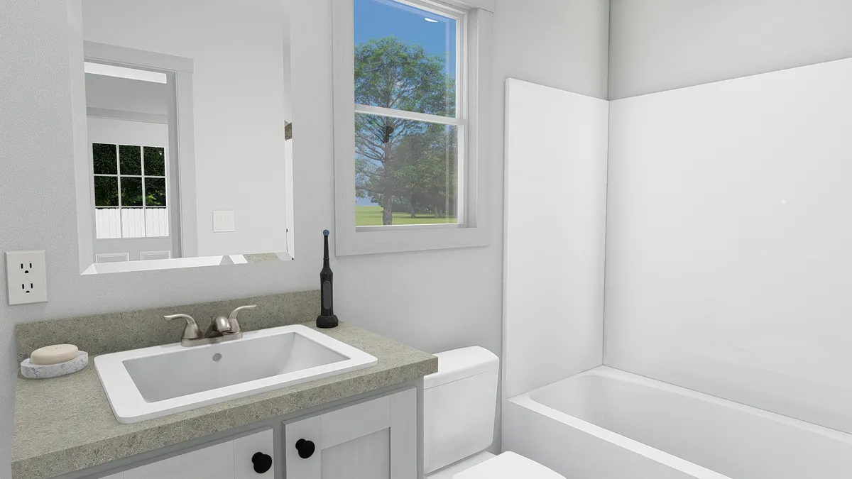 The RESPECT Guest Bathroom. This Manufactured Mobile Home features 2 bedrooms and 2 baths.