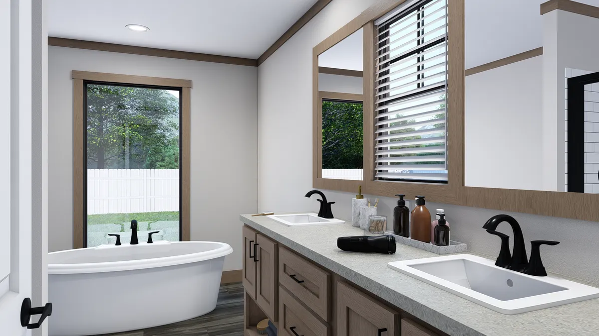 The EMILIE Primary Bathroom. This Manufactured Mobile Home features 3 bedrooms and 2 baths.