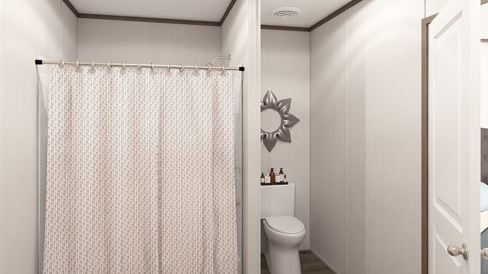 The LEGEND ANNIVERSARY 16X76 Primary Bathroom. This Manufactured Mobile Home features 3 bedrooms and 2 baths.