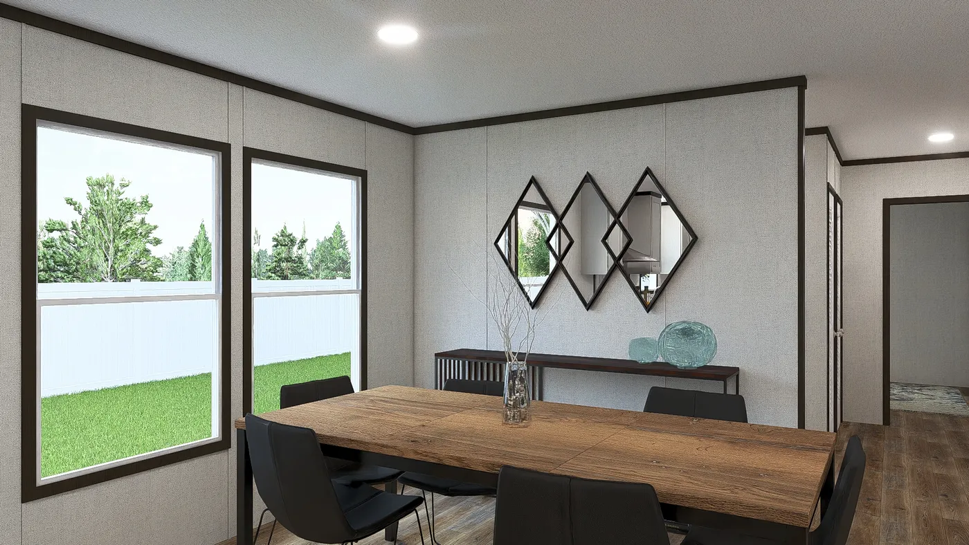 The OCCASSION Dining Area. This Manufactured Mobile Home features 4 bedrooms and 2 baths.
