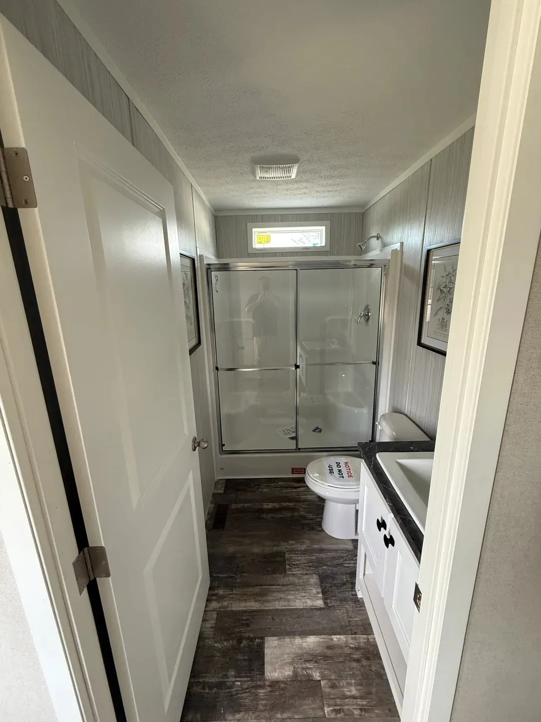 The ONYX Guest Bathroom. This Manufactured Mobile Home features 1 bedroom and 1 bath.