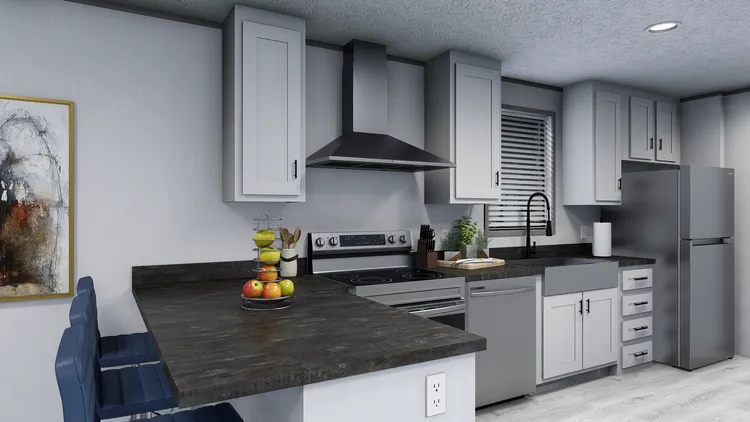The ANNIVERSARY 76 Kitchen. This Manufactured Mobile Home features 3 bedrooms and 2 baths.