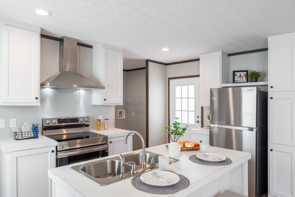 The DYNAMIC Kitchen. This Manufactured Mobile Home features 3 bedrooms and 2 baths.