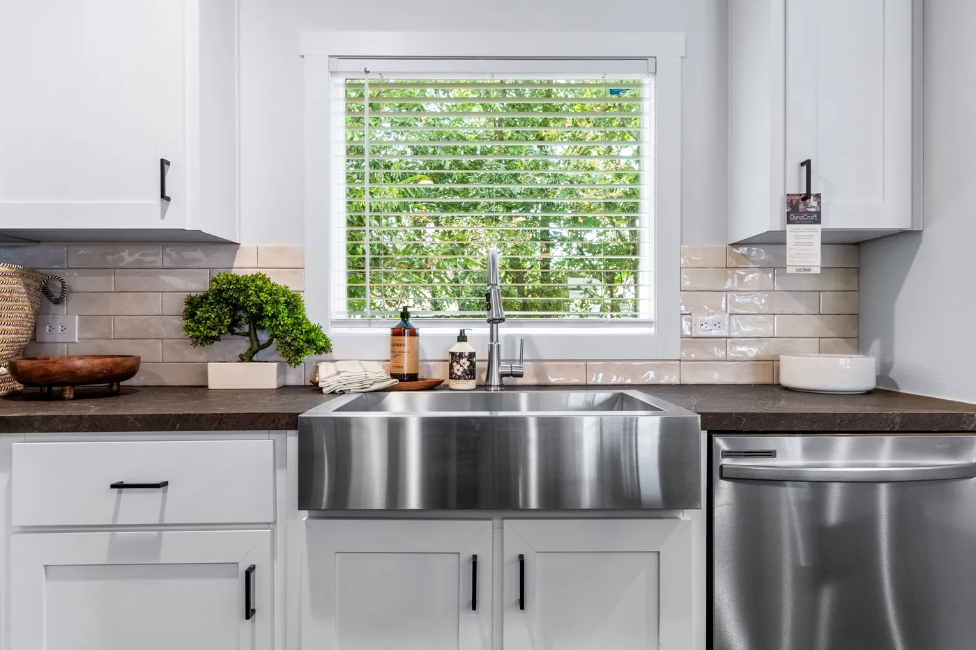 The SAWYER ELITE Kitchen. This Manufactured Mobile Home features 3 bedrooms and 2 baths.