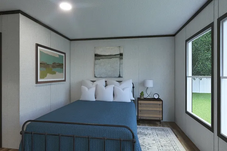 The EMPOWER Bedroom. This Manufactured Mobile Home features 4 bedrooms and 2 baths.