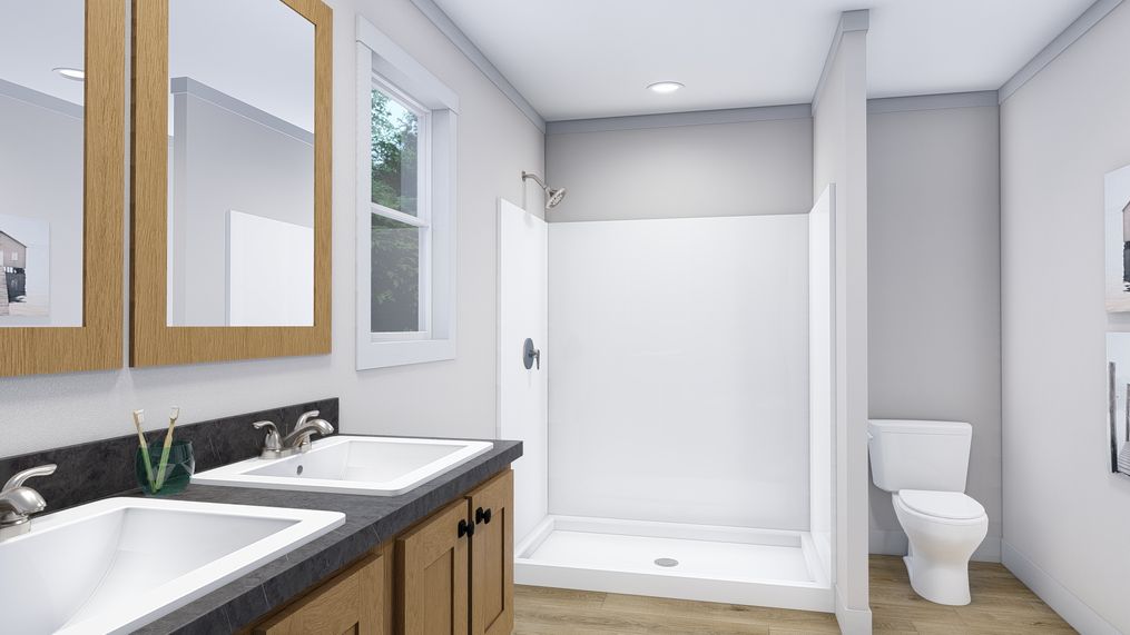The LOVELY DAY Primary Bathroom. This Modular Home features 4 bedrooms and 2 baths.