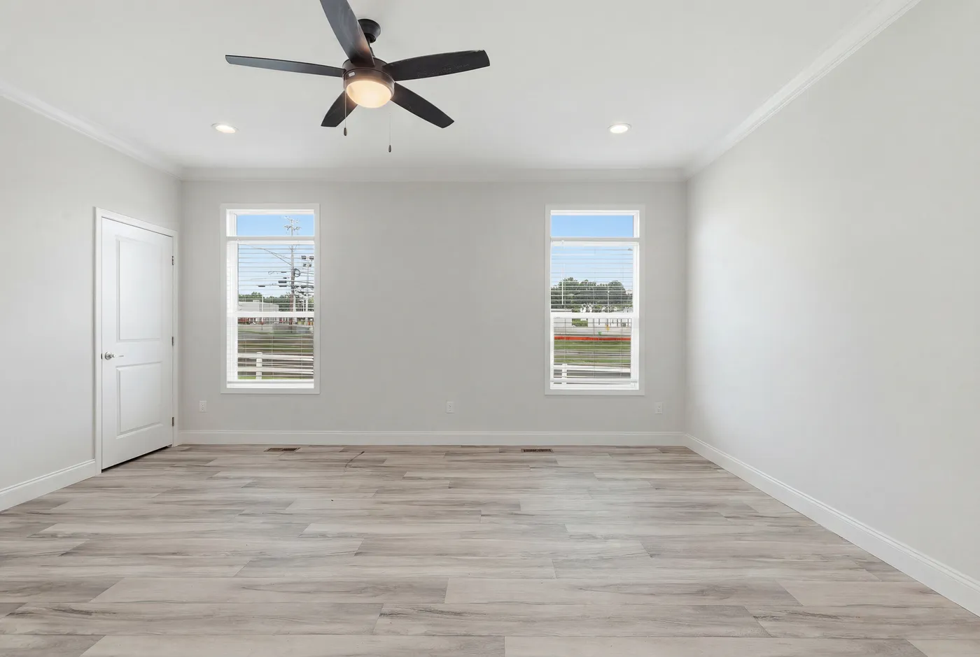 The THE SUMMIT Primary Bedroom. This Manufactured Mobile Home features 3 bedrooms and 2 baths.