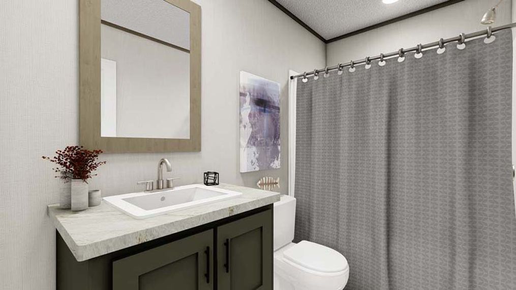 The RIO Guest Bathroom. This Manufactured Mobile Home features 3 bedrooms and 2 baths.