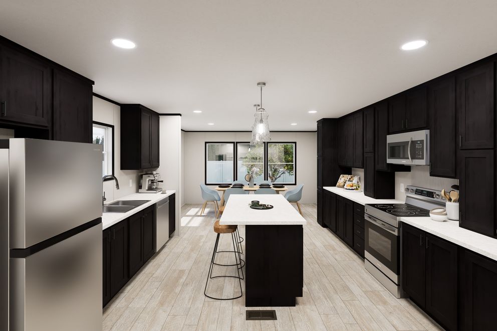 The ULTRA FLEX JEWEL GRANDE Kitchen. This Manufactured Mobile Home features 4 bedrooms and 2 baths.